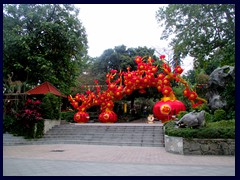 Yuexiu Park (Yuexiu Gongyuan) is a large park in the North part of Yuexiu district, that covers and area of 860 000 sq m. Hills with walking paths, temples, lakes, colourful stuff sculptures, old gates, other structures and bridges can be seen. The ancient Zhenhai Tower pagoda is situated in the park. The Five Rams Sculpture, Ancient Wall, Sun Yat-sen memorial and Yuexiu Stadium can also be found in the park. We visited the park at sunset.